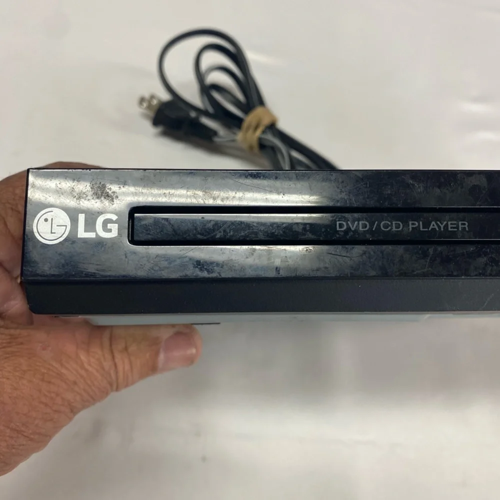 LG DVD/CD Player Model No. DP-132- powers on-ejects-no remote-hdmi cable